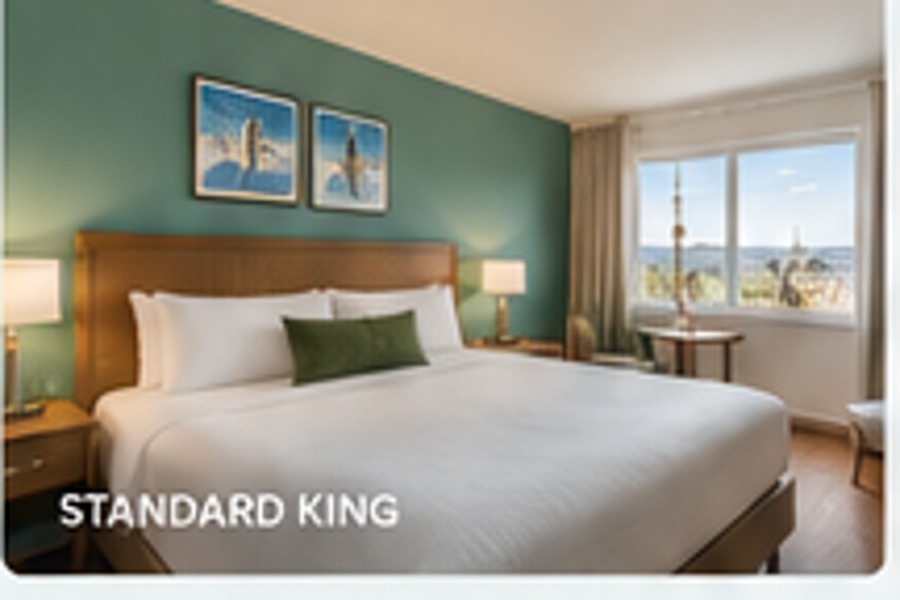 King guest room with white bedding
